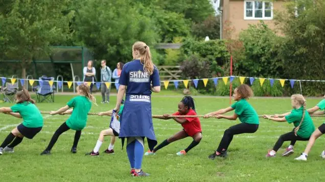 Girls playing tug of war